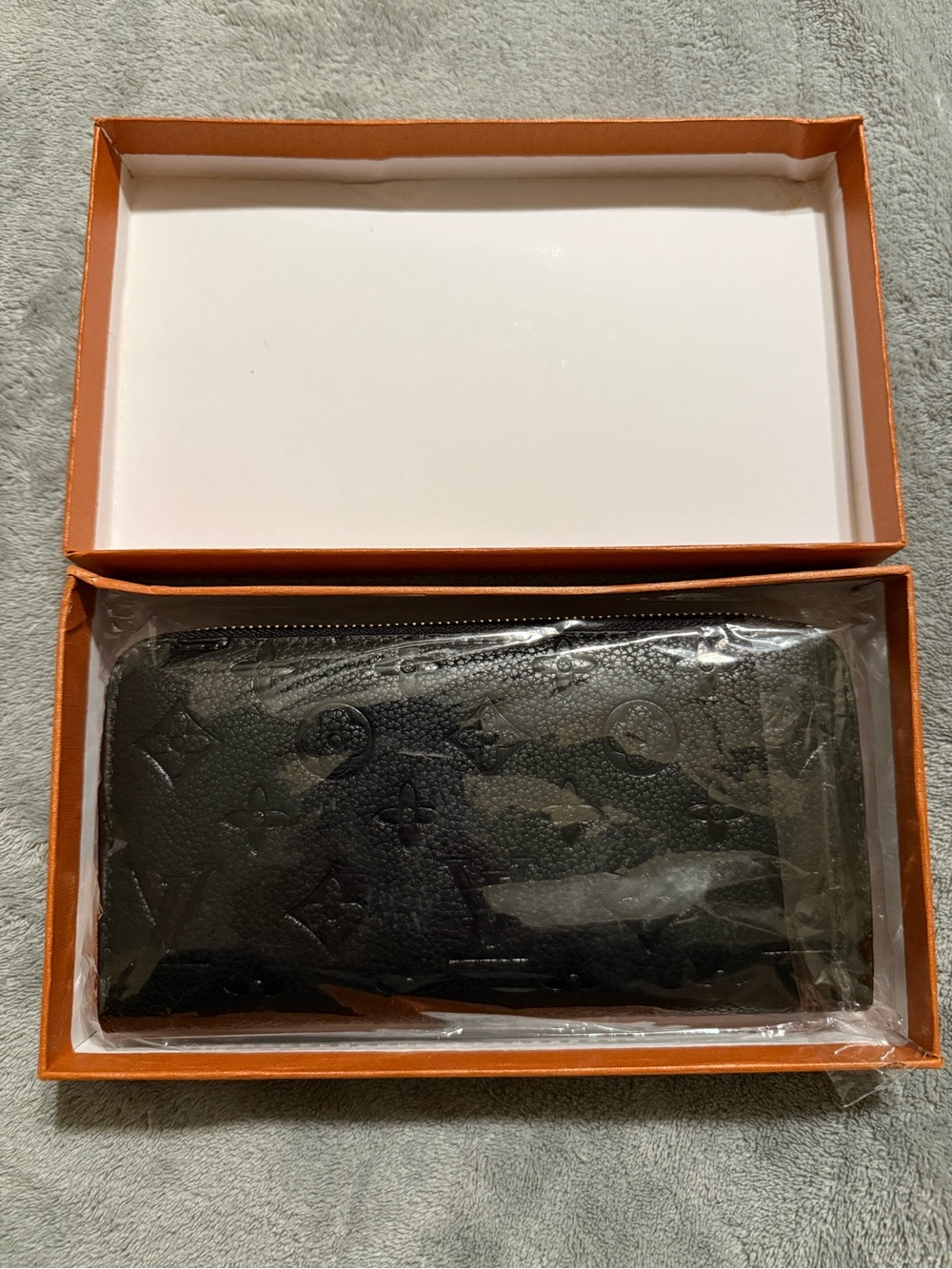 Black Embossed Monogram Zip Wallet